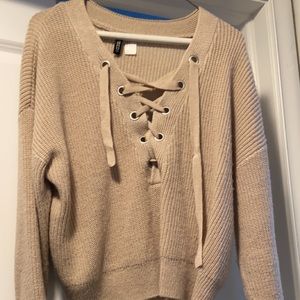 H & M sweater with ties in front, in good condition!